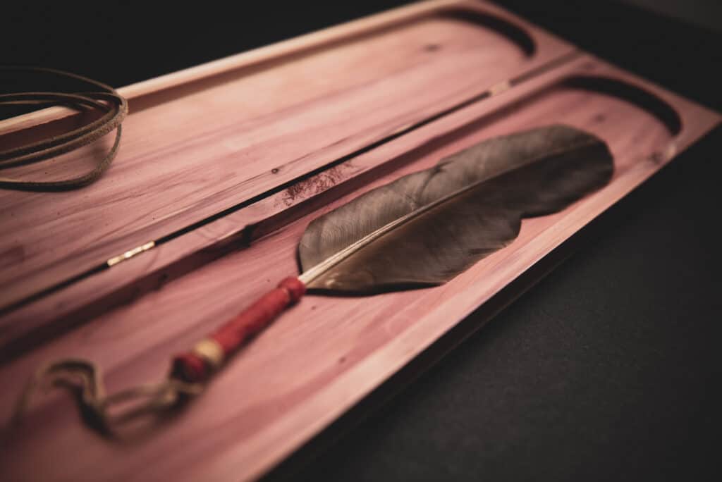 Feather in a wooden box